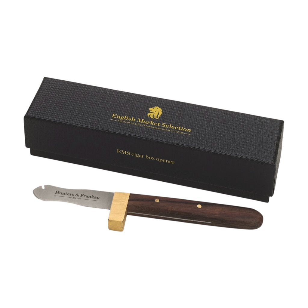 Cigar box opener with wooden handle and gold accents on a white background